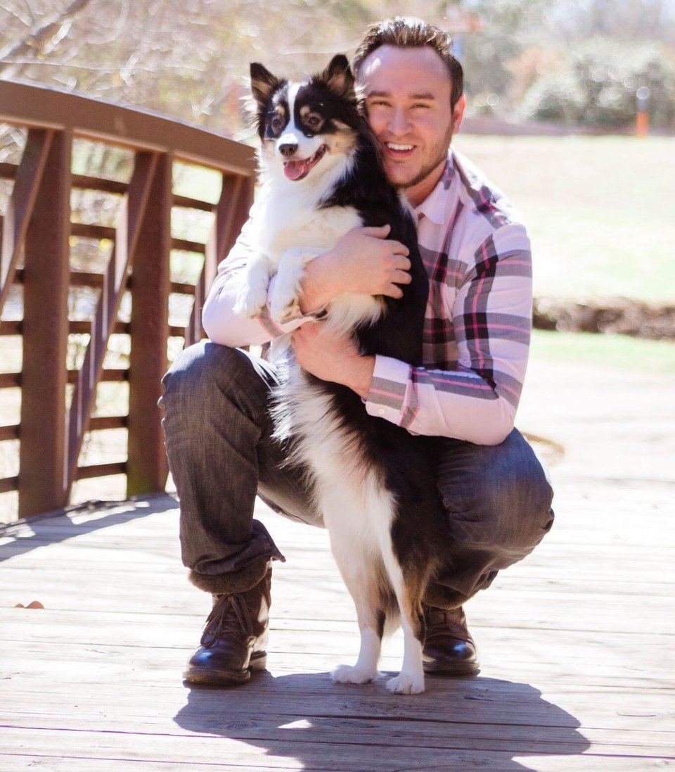 Eric, the founder of K9 Cinemas, and his dog Bear