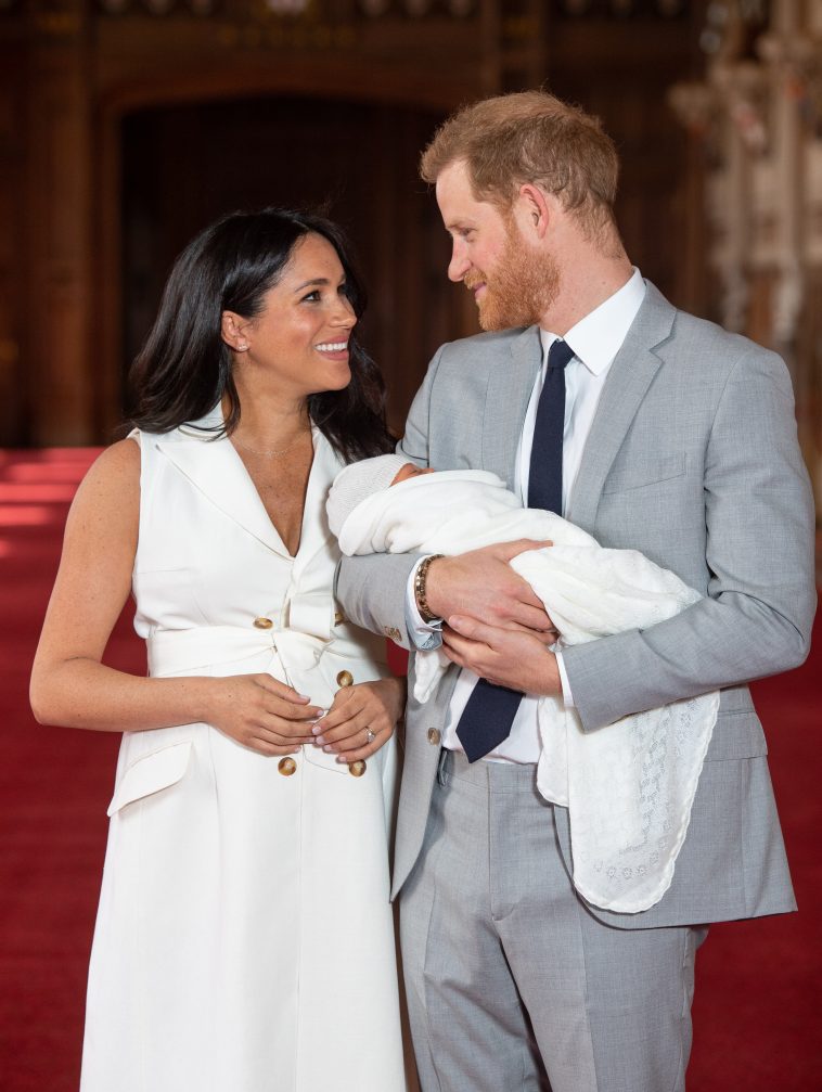 prince harry and meghan markle with new baby