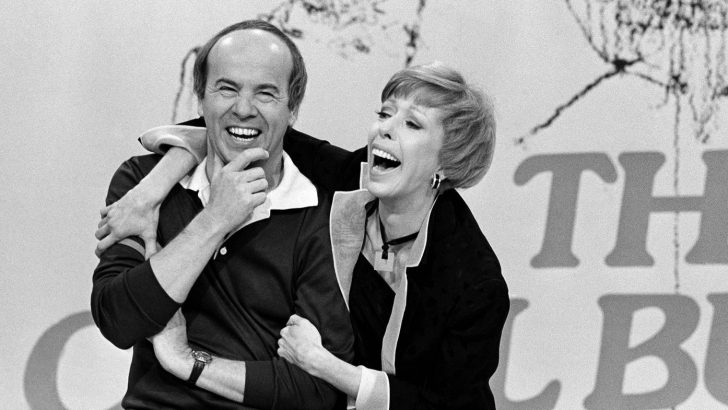 Tim Conway and Carol Burnett laughing together 