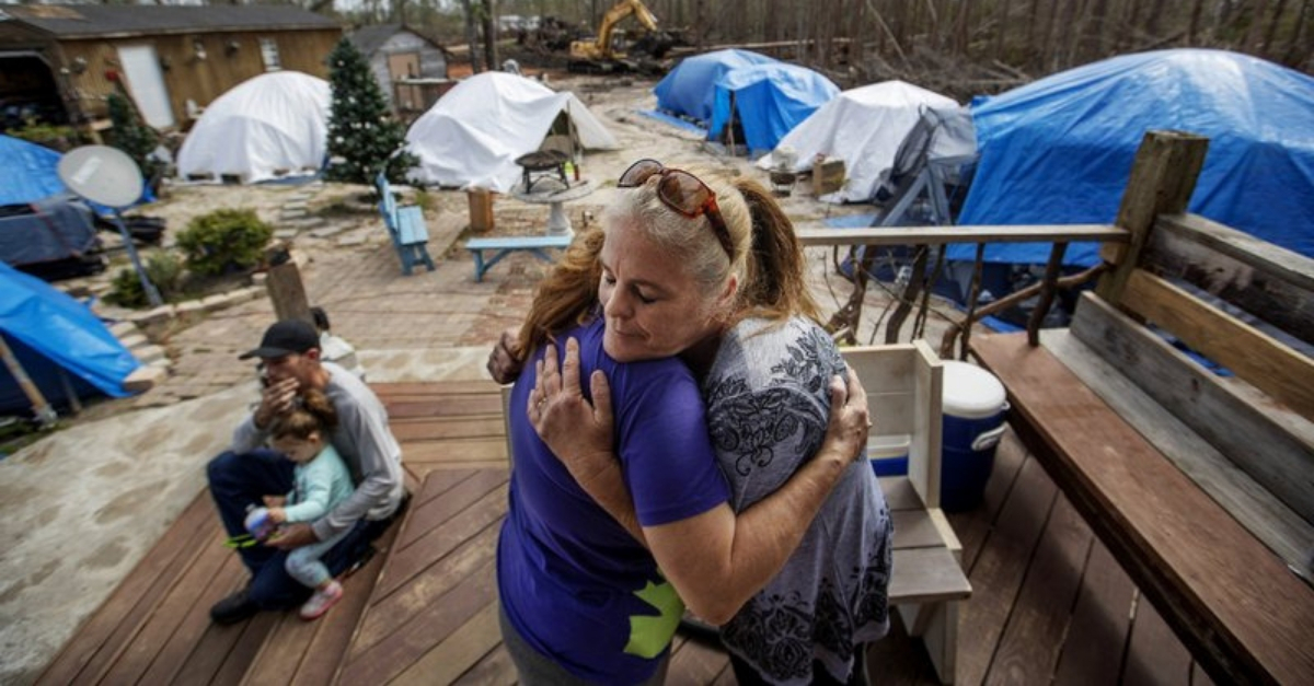woman helps victims of hurricane michael with tent community