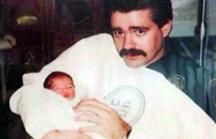 Officer Michael Buelna with abandoned baby