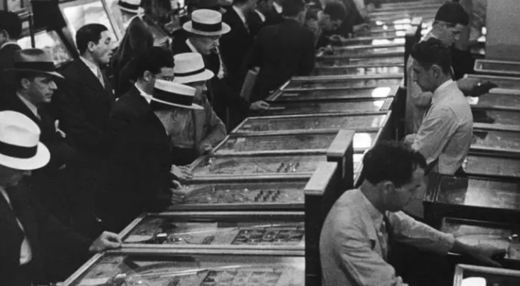 People playing pinball in the 40s
