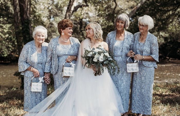 bride has her 4 grandmas as flower girls