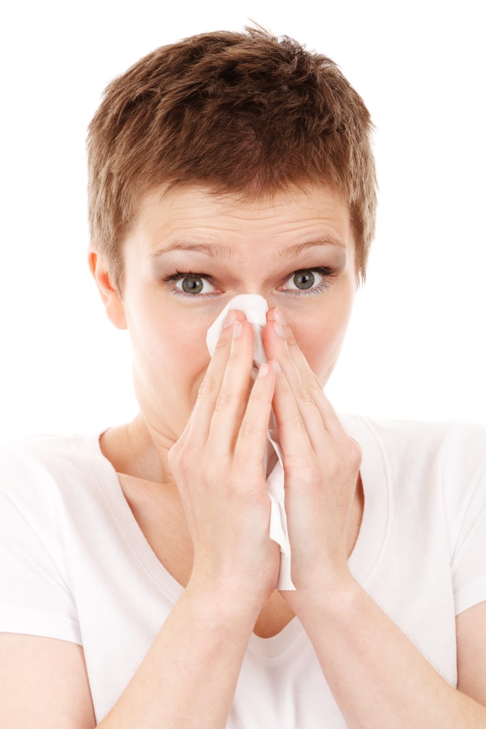 person blowing nose sick flu