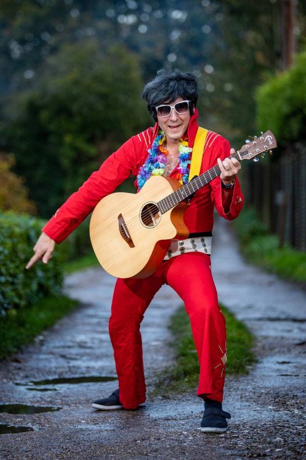 elvis impersonator not let on stage