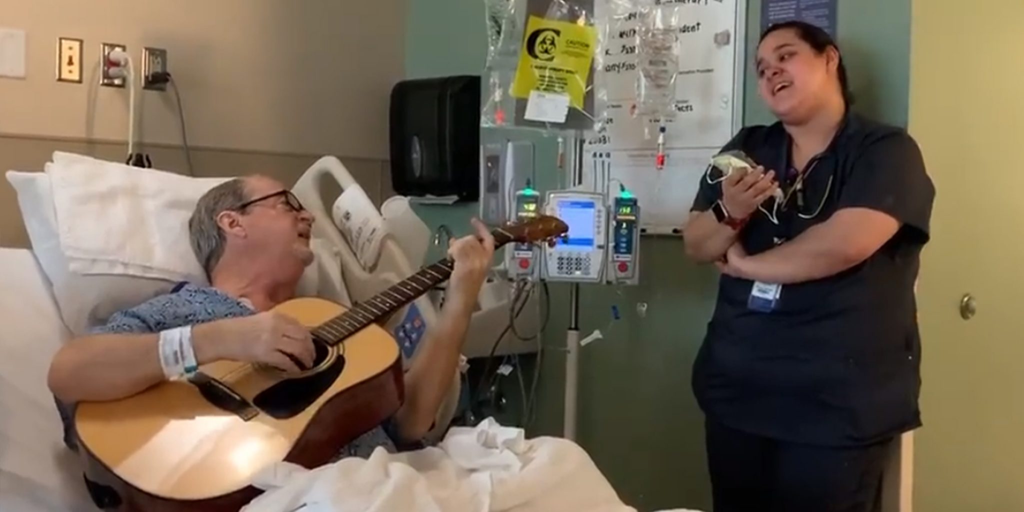 chemo patient sings "o holy night" with nurse