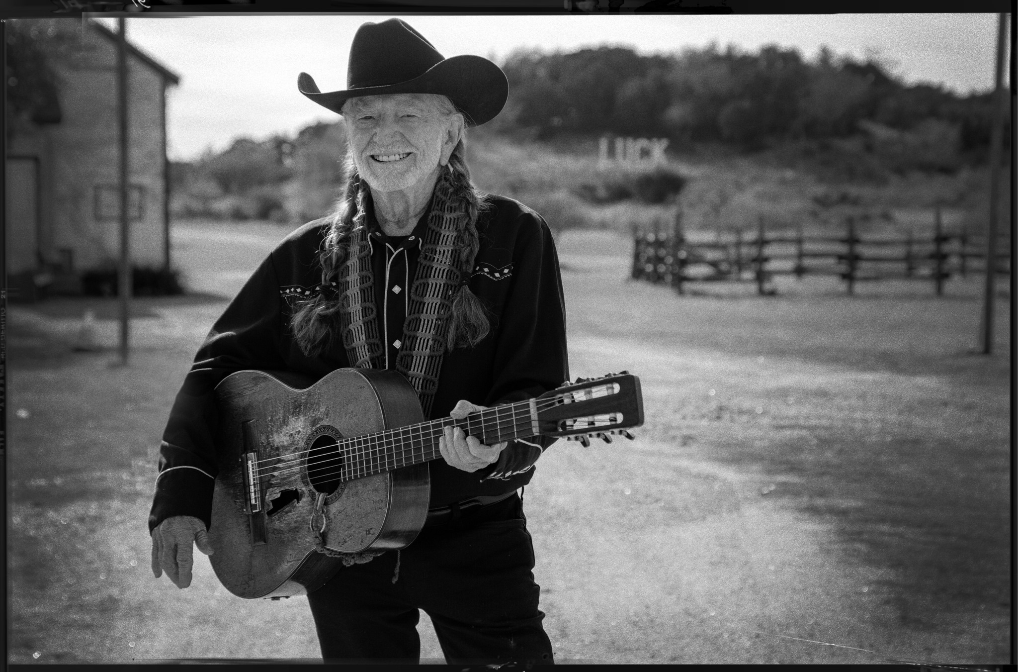 willie nelson guitar black and white 