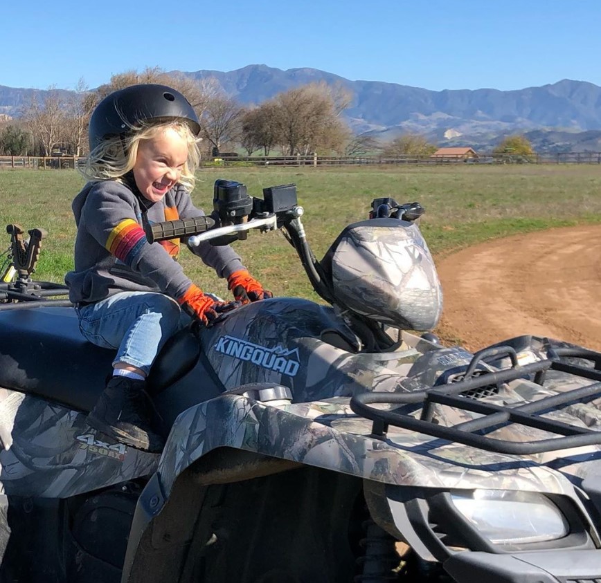 pink carey hart son jameson four wheeler 