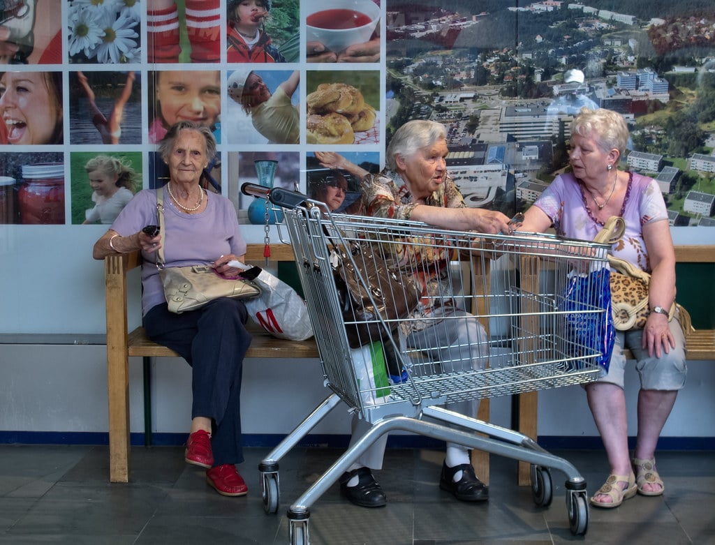 seniors with shopping cart