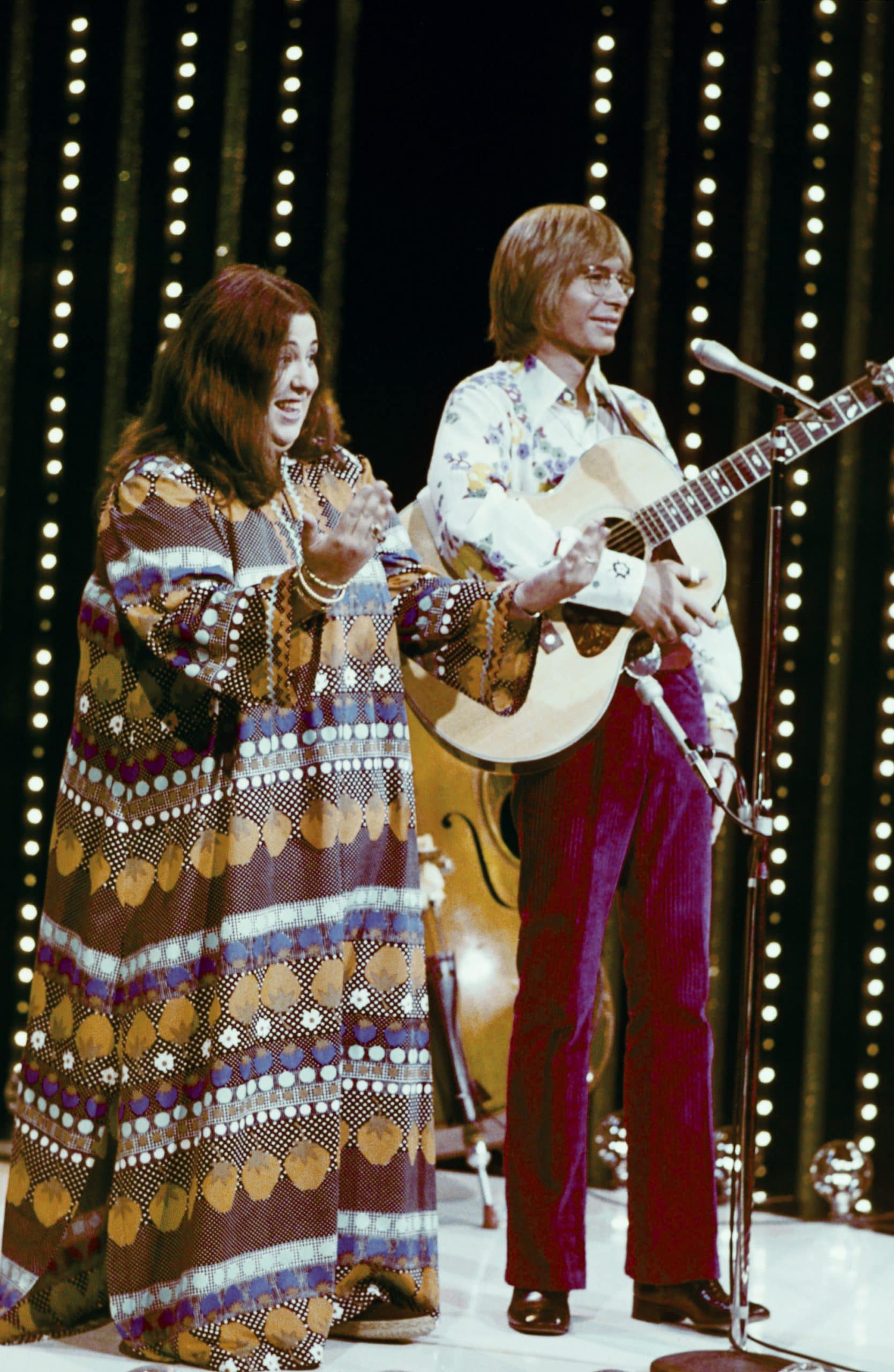 WATCH: Rare Performance Of John Denver & Cass Elliot Singing "Leaving On A Jet Plane"