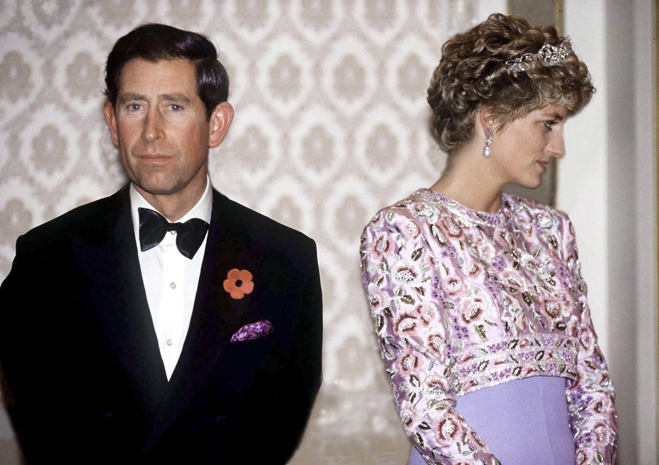 prince charles and princess diana looking unhappy